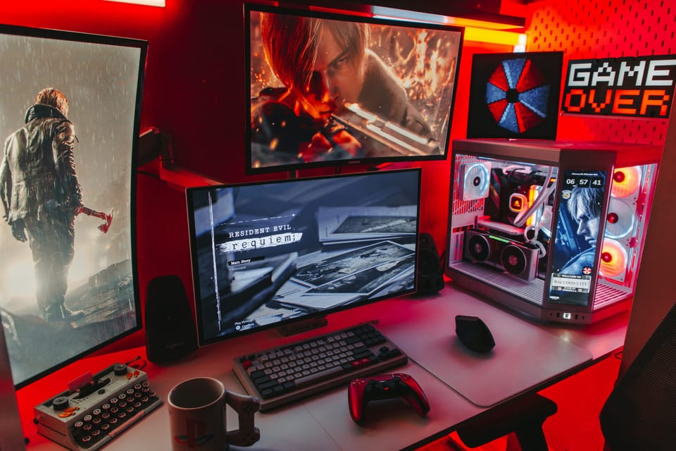 Gaming and streaming setup with multiple monitors and RGB lighting
